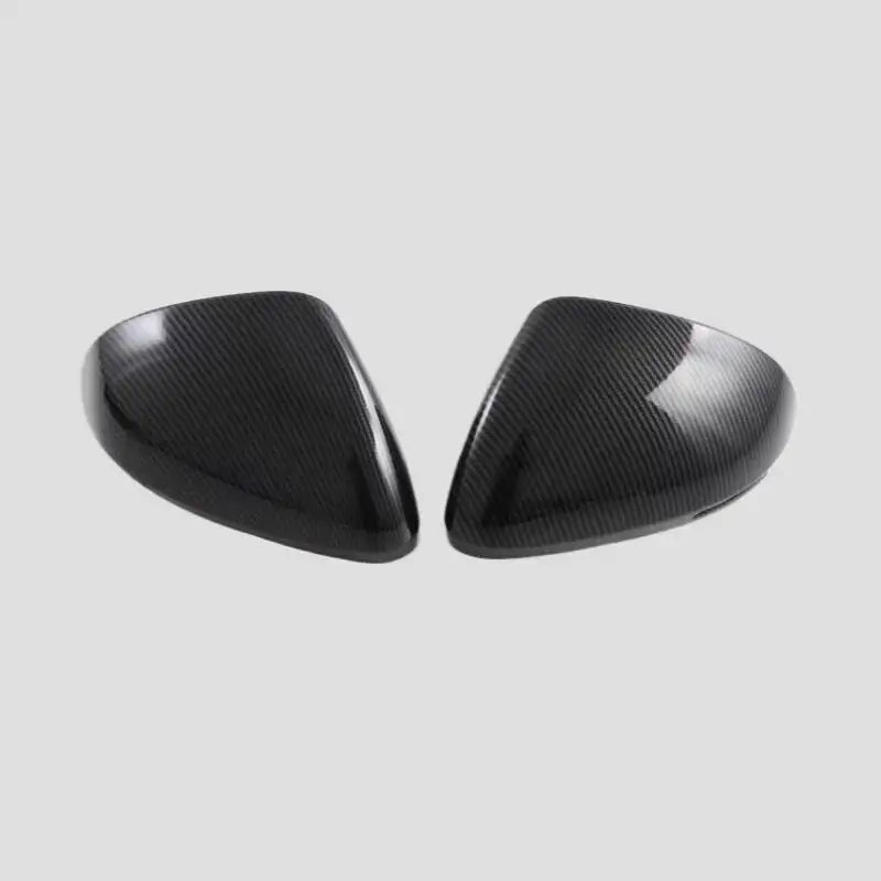 Carbon fiber mirror caps for EVs, sleek black finish, glossy texture
