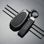 Denza car key fob with leather keychain, sleek black and silver design for EV accessories