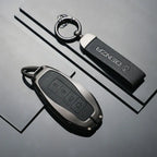 DENZA car key fob with leather keychain, sleek black design for EV accessories
