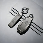 DENZA car key fob and keychain set, sleek black design for electric vehicle accessories