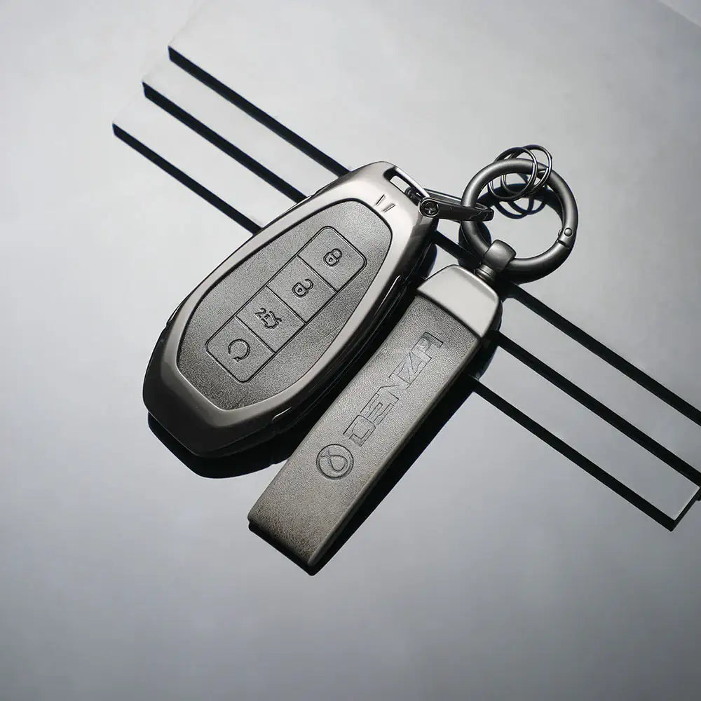Mercedes-Benz key fob with sleek metal cover and keychain, premium EV accessory